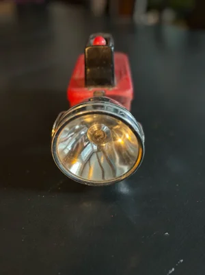 Red vintage flashlight — The Hintonburg Public House