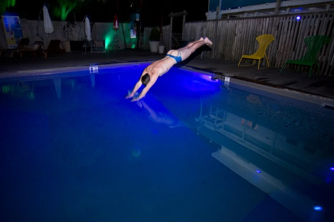 fire island pines august 17 & 18 2013 5; kid diving blue pool ass.jpg