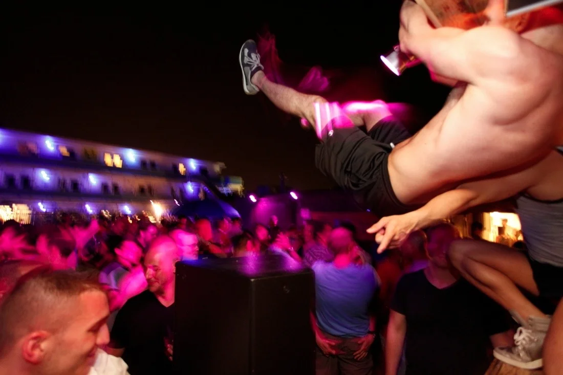 fire island pines memorial day weekend 2012; ross swinging from dj booth.jpg