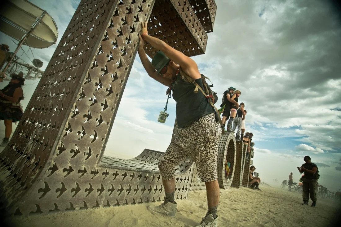 burning man 2014 40; laura kimpton & jeff schomberg love sculpture push.jpg