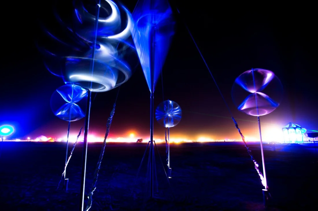 burning man 2013 301; long exposure night - wind mobiles from bike guard fenders.jpg