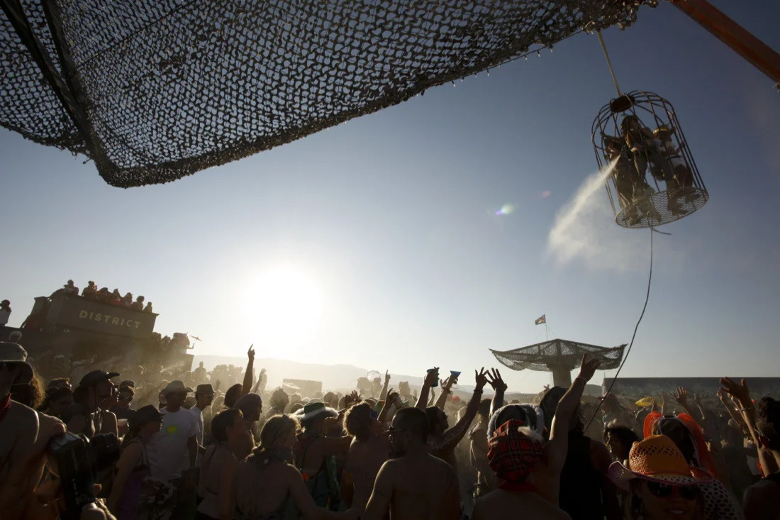 burning man 2011 515; distikt crane cage water sprayer madness.jpg