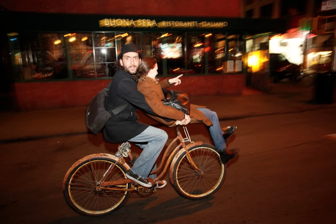 guy riding girl on his bike.jpg