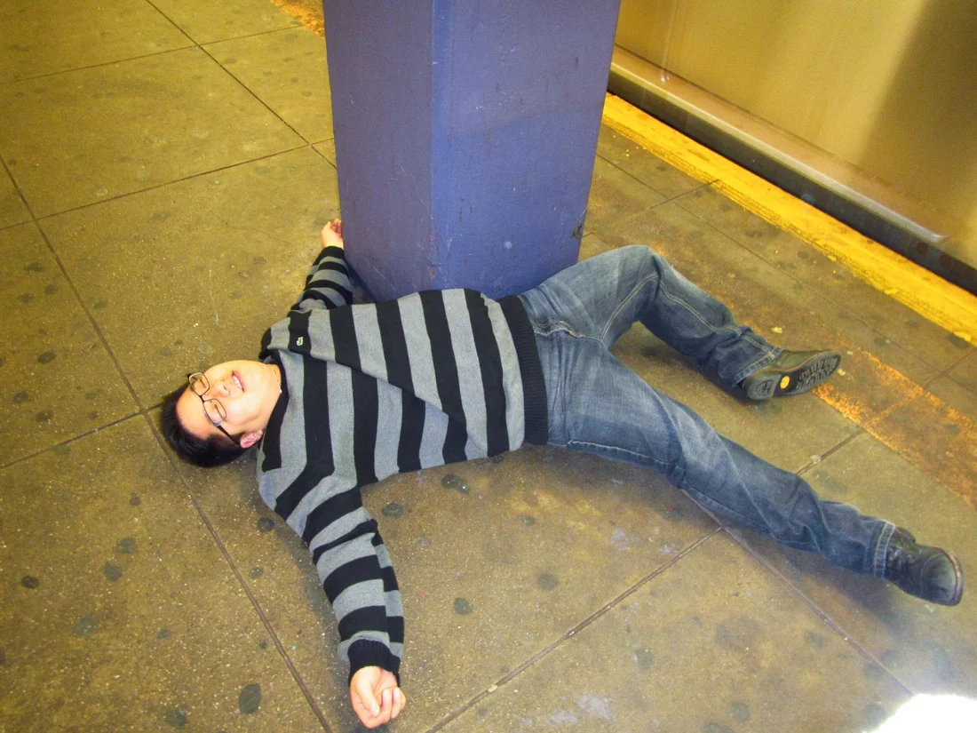 drunk passed out asian train station.jpg
