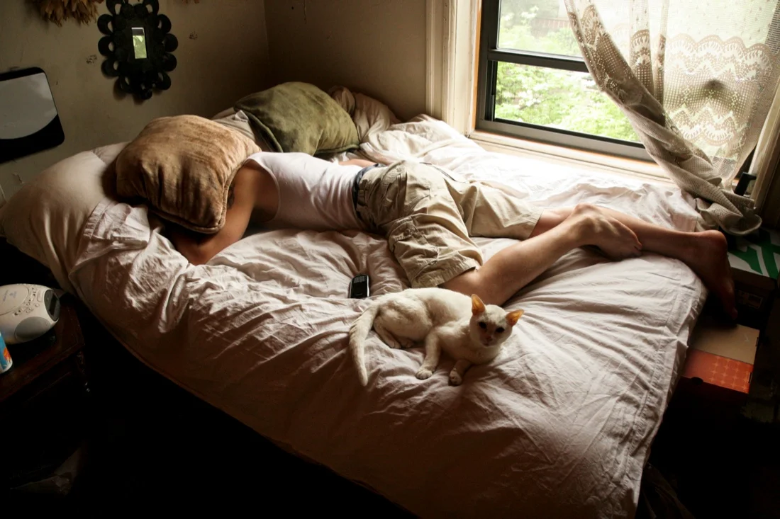 mike napping:sleeping with molly.jpg
