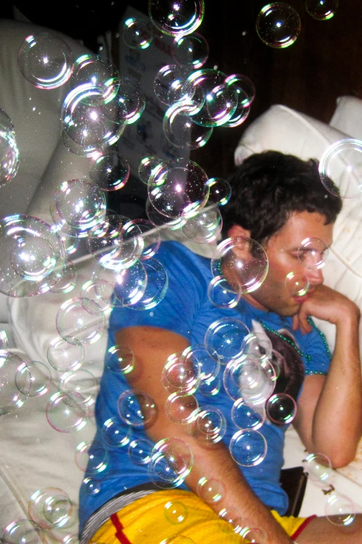 fire island pines august 29 & 30 2009; passed out guy & bubbles.jpg