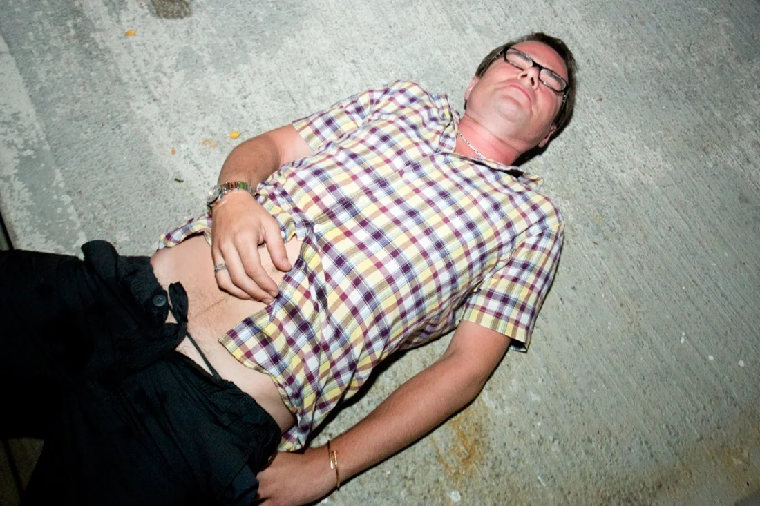 fire island pines independence day 122; passed out guy concrete.jpg
