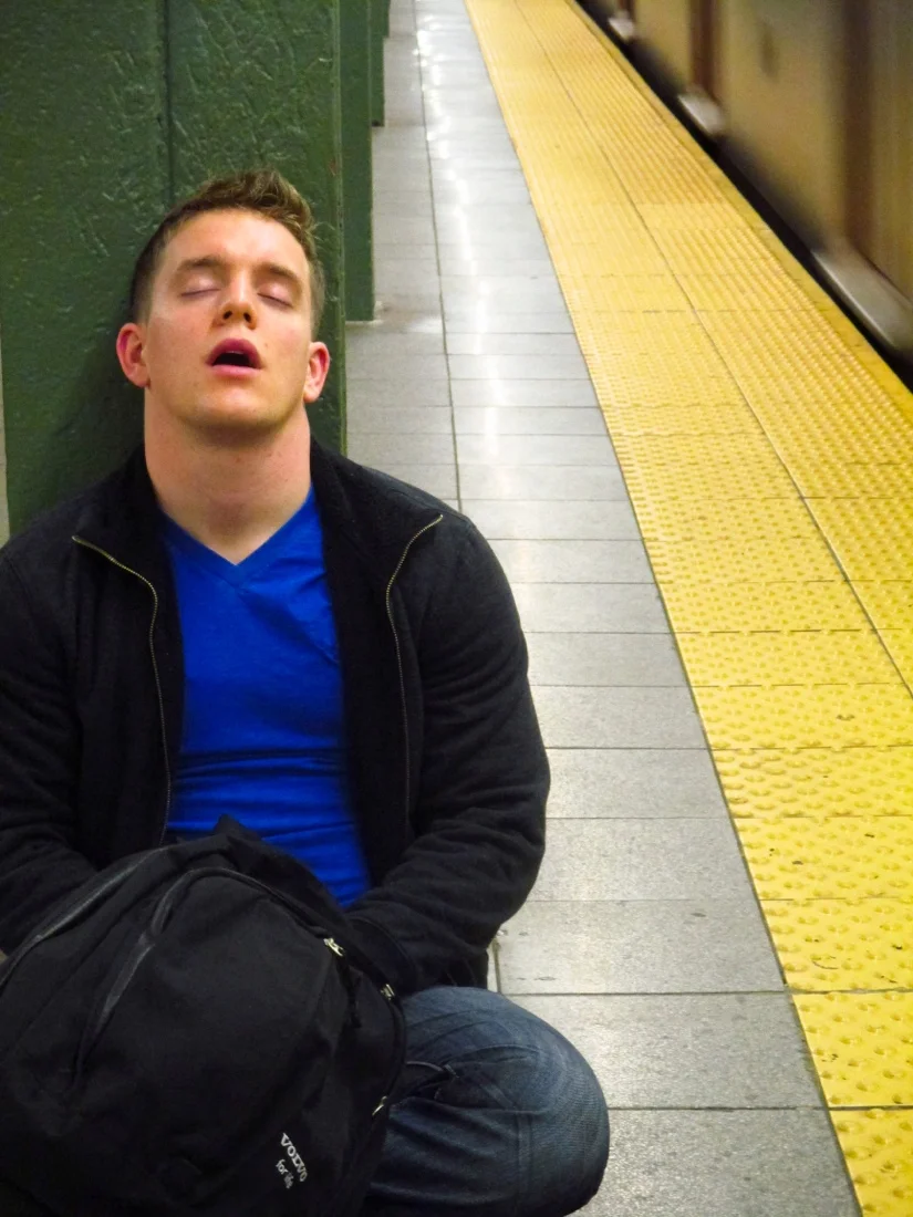 sleeping guy in train station april 2013.jpg