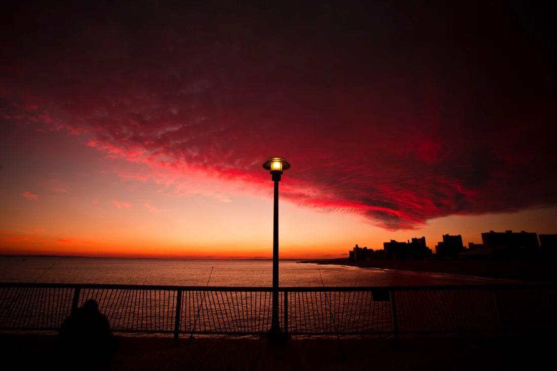 Coney Island Sunset; Pier Clouds Fisherman Silhoeutte.jpg