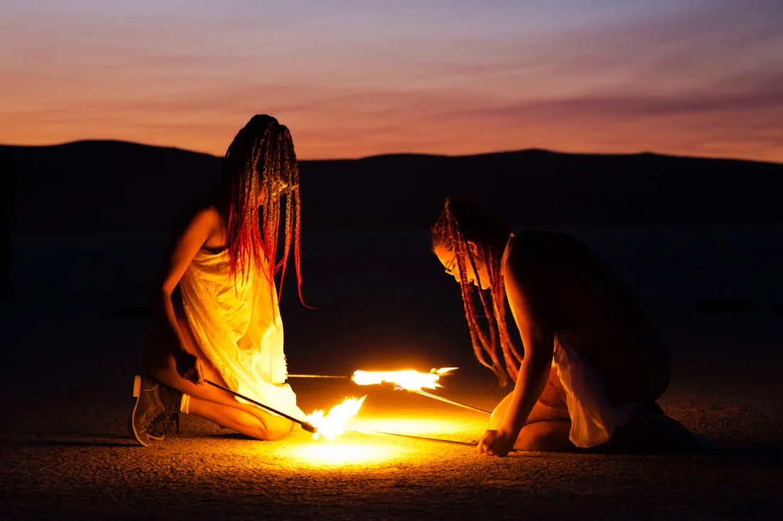 Burning Man 2018 155; WanderLOVE Circus Collective Fire Spinning Sunset.jpg