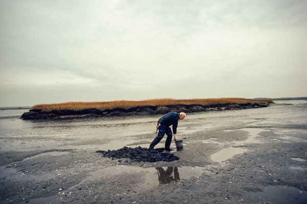 Franklyn E. Goucher, an Essex, Mass., clammer, digging on a sand flat in 1978, in the coming show "Kodachrome Memory: Nathan Benn's North Shore, 1978'' at the Cape Ann Museum, Gloucester, Mass., Dec. 27-Feb. 19. This show will display 30 photos taken by Mr. Benn while on assignment by the National Geographic Magazine on the North Shore in 1978. The National Geographic article was entitled ''Harboring Old Ways''.