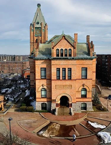 Brockton &nbsp;City Hall, a Romanesque pile built in 1892-94 as the city was moving toward its most prosperous period, albeit with such horrors as child labor and gruesome industrial accidents.