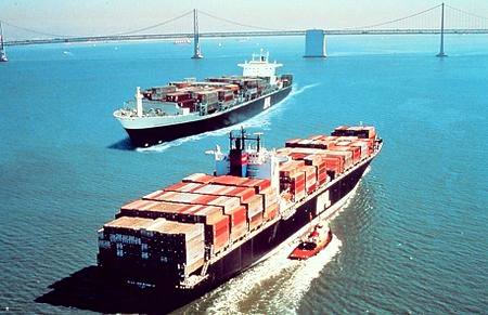 Containerships carrying international cargo.