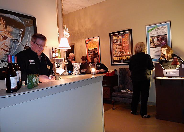 Theater co-founder Lloyd Felix mans the bar. Photo: Linda Gasparello