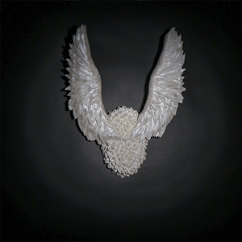 "Wings'' (mixed media ink jet print), by Mara Trachtenberg, in the joint show "Wings,'' with Uli Brahmst, at Hera Gallery, Wakefield, R.I., through May 5 . This show interpretes the wing motif, as idea and physical subject, in different media. Wings are symbols of flight, hope and freedom. Ancient myth has it that winged creatures can transverse the physical and cosmic realms --- through diverse realities.