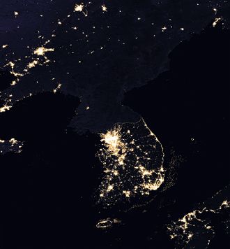 The Korean Peninsula at night. Note the brightness of Seoul, the South Korean capital, and the darkness of North Korea.