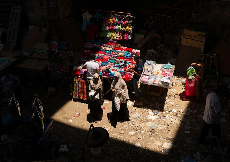 --Photo by Frank Schulenberg Women shopping at a bazaar in Cairo .