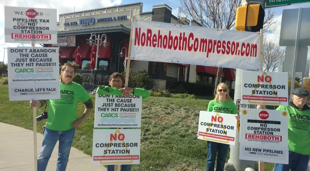 Opponents of a proposed natural-gas pipeline compressor station recently protested outside a local restaurant, where Gov. Charlie Baker stumped for Attleboro's mayor.-- Photo by Tim Faulkner for ecoRI News
