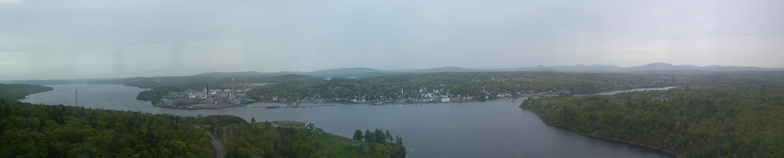 Bucksport, Maine, from the top of the Penobscot Narrows Bridge . The town may be a partial model for “Bealport’’ in Jeffrey Lewis’s new novel.
