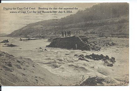 Postcard_view_of_breaking_the_dam_of_the_Cape_Cod_Canal,_July_1914.jpg