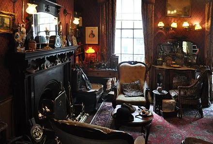 Victorian-style sitting room with a fireplace in the Sherlock Holmes Museum , London