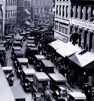 “Newspaper Row,’’ on Washington Street in Boston, in September 1929, right before the stock market crash in the next month. The Boston Globe was at 244 Washington St., the Boston Evening Transcript at 324 Washington (at Milk Street), the Boston Post at 261 Washington, the Boston Journal at 264 Washington and the Associated Press at 293 Washington. Other Boston news services, including the Boston Herald and Boston Traveler , were not far from Newspaper Row. It was a noisy and crowded part of downtown.