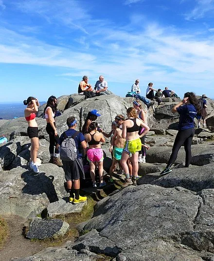 The top of Mount Monadnock on a typically crowded day in warm weather.