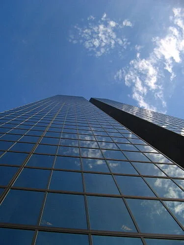 The lack of ornamentation, or other breaks along the surface, on Boston’s 200 Clarendon Street (aka Hancock Tower) skyscraper here, the city’s tallest, is said to worsen the local wind-tunnel effect.