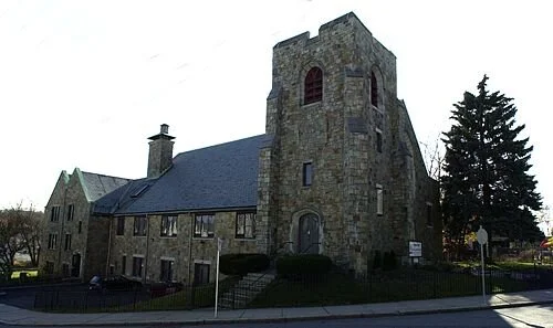 The First Congregation Church in Boston’s Hyde Park neighborhood, whose unofficial motto is “A Small Town in the City.’’ A mobile COVID-19 testing site has been opened there for the uninsured.