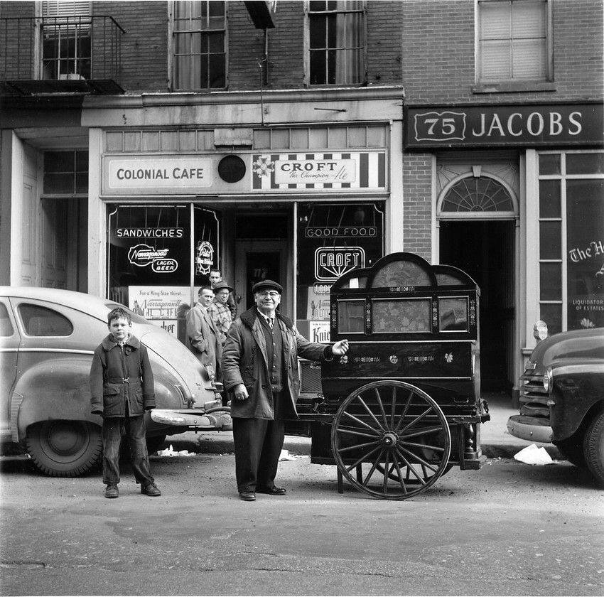 Photo and caption material forwarded by David Jacobs of The Boston GuardianDo you remember this sort of thing in downtown Boston in the ‘50s?Marino Antonio Persechini (center) is seen on Charles Street with his hurdy-gurdy, a musical device that, ow…