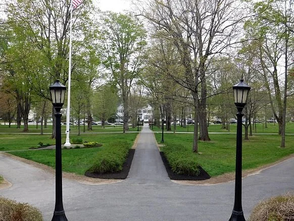 In Lewiston, view from the steps of Bates College’s&nbsp;Hathorn Hall looking  toward quad and&nbsp;Lindholm House, the admissions office