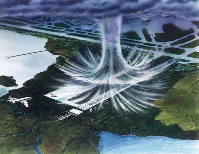 In a microburst, air moves in a downward motion until it hits ground level and then spreads outward in all directions. The wind regime in a microburst is opposite to that of a tornado.