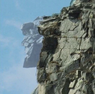 A composite image of the Old Man of the Mountain created from images taken before and after the collapse.