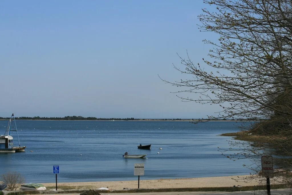 Rope's Beach, in Cotuit, looking onto Cotuit Bay. Cotuit has drawn many artists to work and show there , mostly in the summer, since the late 19th Century.