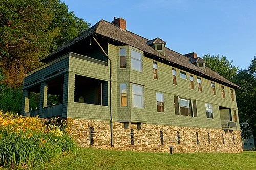 The Rudyard Kipling House is a  Shingle Style house on Kipling Road in Dummerston, Vt., a few miles outside Brattleboro. The house was designated a National Historic Landmark in 1993 for its association with the English author Rudyard Kipling (1865–1936), who had it built in 1893 and made it his home until 1896. It is in this house that Kipling wrote Captains Courageous, The Jungle Book, The Day's Work, and The Seven Seas, and did work on Kim and The Just So Stories. The house is now owned by the Landmark Trust, and is available for rent.