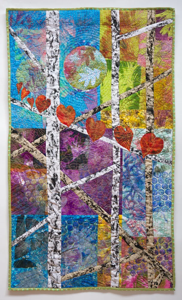 “Winter Fire” (mono-printed fabric hand sewn with perle cotton), by Agusta Agustsson, in her show “Forest Bathing,’’ at Galatea Fine Art, Boston, through Oct. 1-Oct 31.She explains:"My walks through {The Middlesex} Fells on the edge of my city provide me with inspiration, material resources and spiritual sustenance. These pieces portray those moments seen from the corner of my eye, sensations rather than clear visions. It might be a branch of beech leaves seemingly afire in a sudden bolt of sunshine or the piney aroma as my feet tread my path. On my walk shapes and textures of common plants will catch my eye and come back to my studio to print fabric for my next piece. As I walk through well-worn paths I see the earth is capable of great renewal. I hope we as a species will allow it to happen.’’