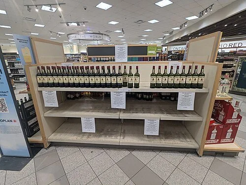 Empty_LCBO_shelves.jpg