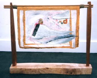   Bound and Determined &nbsp;  Newspapers found in bookstores and libraries have always fascinated me, as daily newspapers are often suspended on wooden dowels in such settings. &nbsp;This suspension transforms a newspaper into a book or manuscript. 