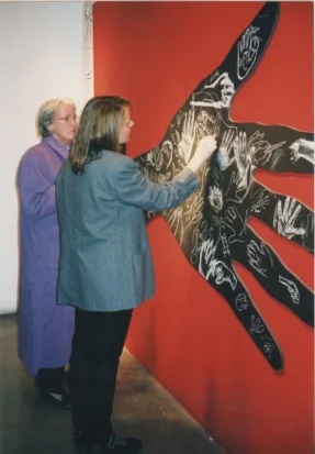   Lend a Hand  is an interactive installation that has been incorporated into numerous exhibitions, including Seattle Pacific University and the Northwest BookFest. &nbsp;Participants were invited to "leave their mark" through handwriting and image-m