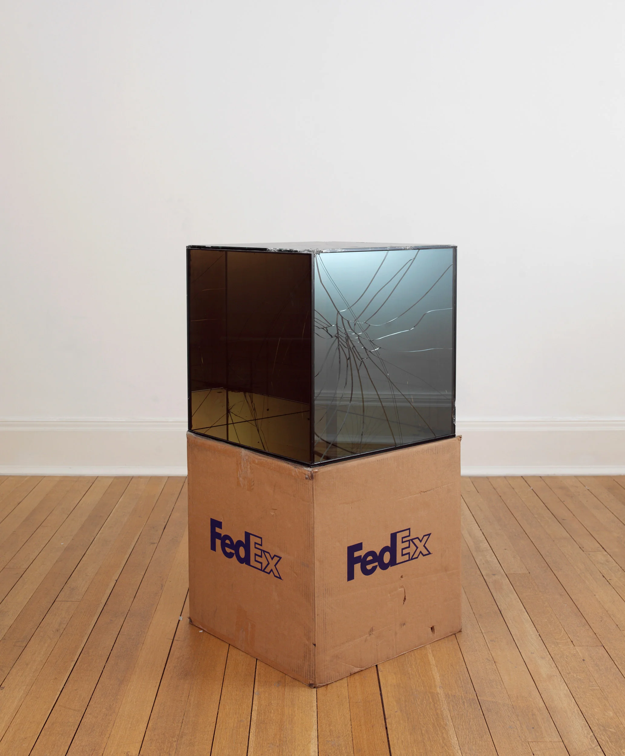 FedEx® Large Kraft Box © 2008 FEDEX 330510 REV 6/08 GP, International Priority, Los Angeles–London trk#868587728072, October 02–05, 2009 2009– Laminated Mirropane, FedEx shipping box, accrued FedEx shipping and tracking labels, silicone, metal, tape 20 x 20 x 20 inches FedEx Glass Works, 2007–