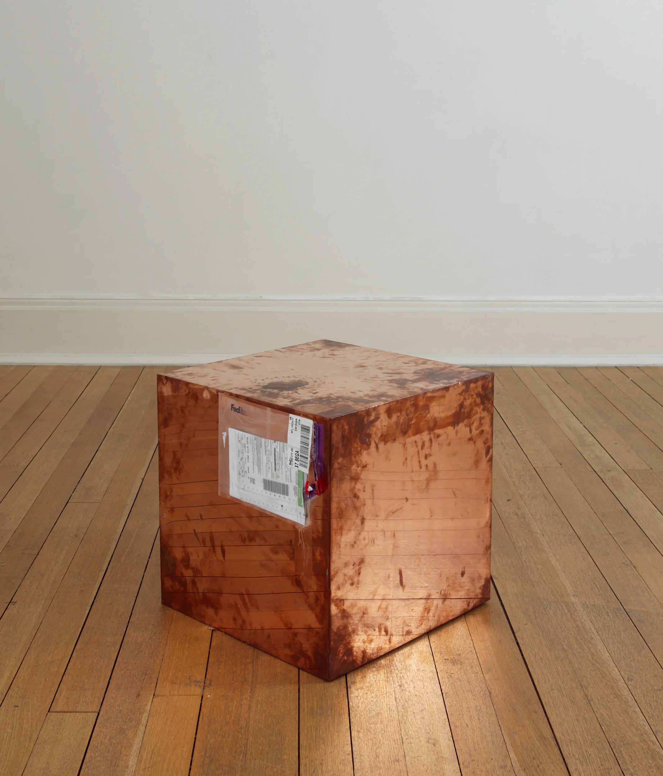 FedEx® Large Kraft Box © 2005 FEDEX 330508 REV 10/05 SSCC, International Priority, Los Angeles–London trk#868587728061, October 2–5, 2009, International Priority, London–Zurich trk#863822956490, November 26–December 2, 2009 2009– Polished copper, accrued FedEx shipping and tracking labels 20 x 20 x 20 inches FedEx Copper Works, 2009–