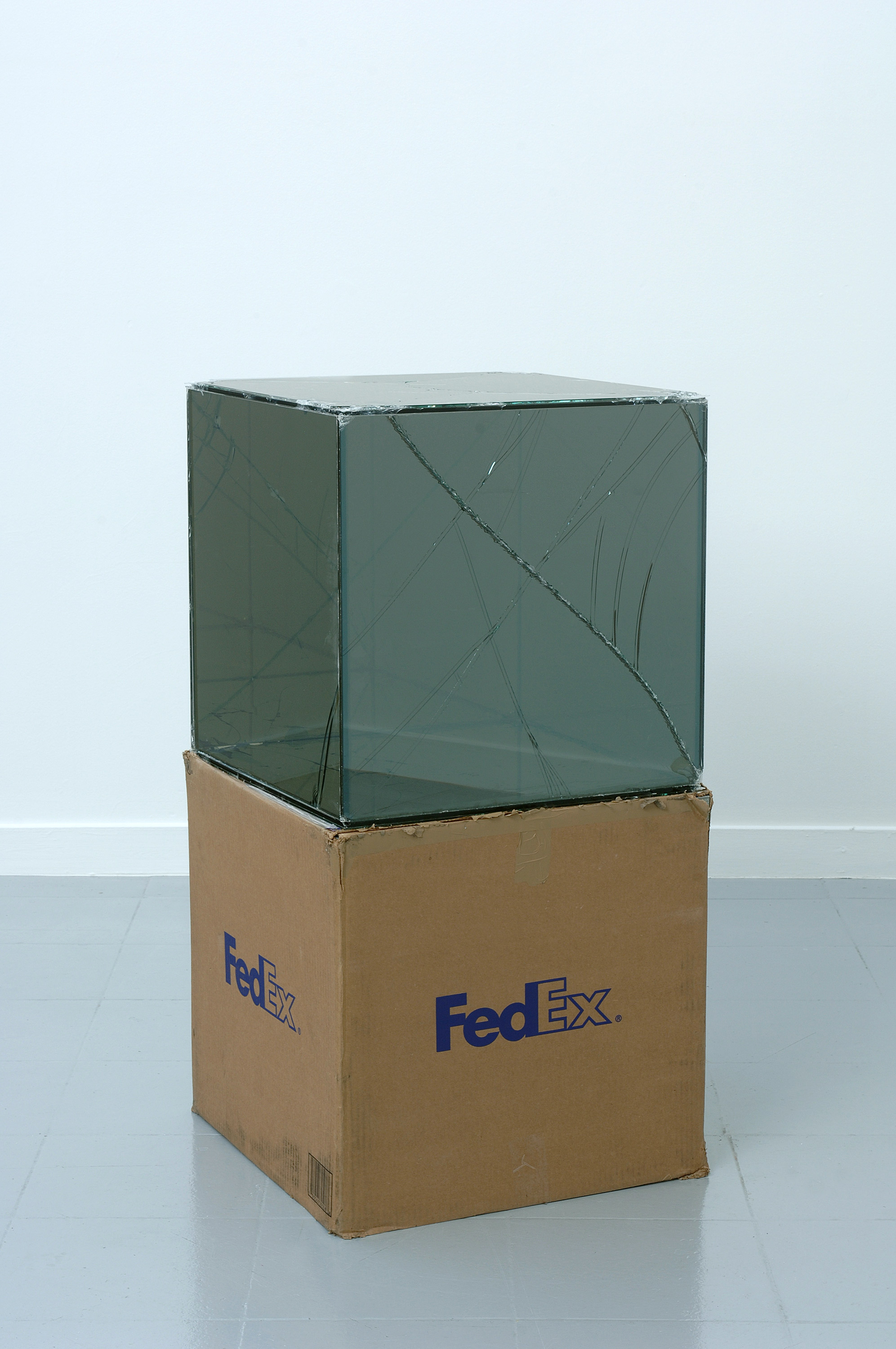   FedEx® Large Kraft Box 2005 FEDEX 330508 REV 10/05 SSCC, International Priority, Los Angeles–Brussels trk#865282057942, October 27–30, 2008    2008–   Laminated Mirropane, FedEx shipping box, accrued FedEx shipping and tracking labels, silicone, m