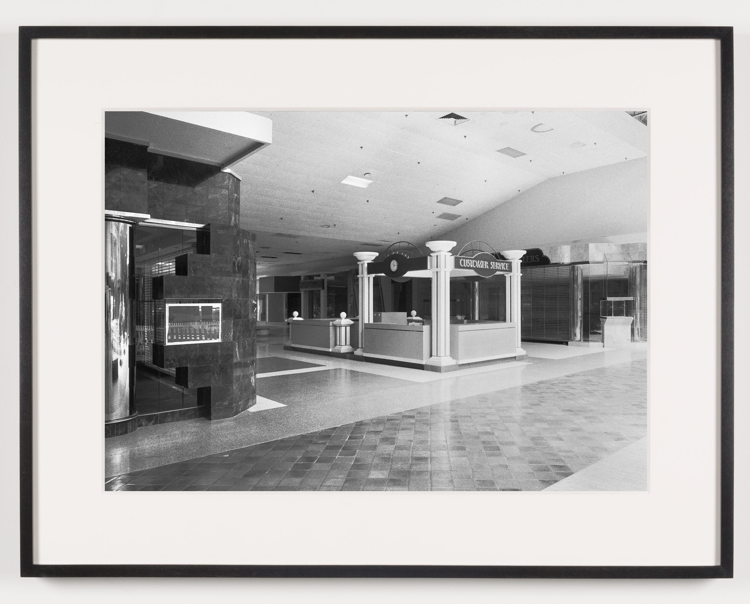   Rolling Acres Mall (View of Customer Service Kiosk), Akron, OH, Est. 1975    2011   Epson Ultrachrome K3 archival ink jet print on Hahnemühle Photo Rag paper  21 5/8 x 28 1/8 inches   American Passages, 2001–2011     