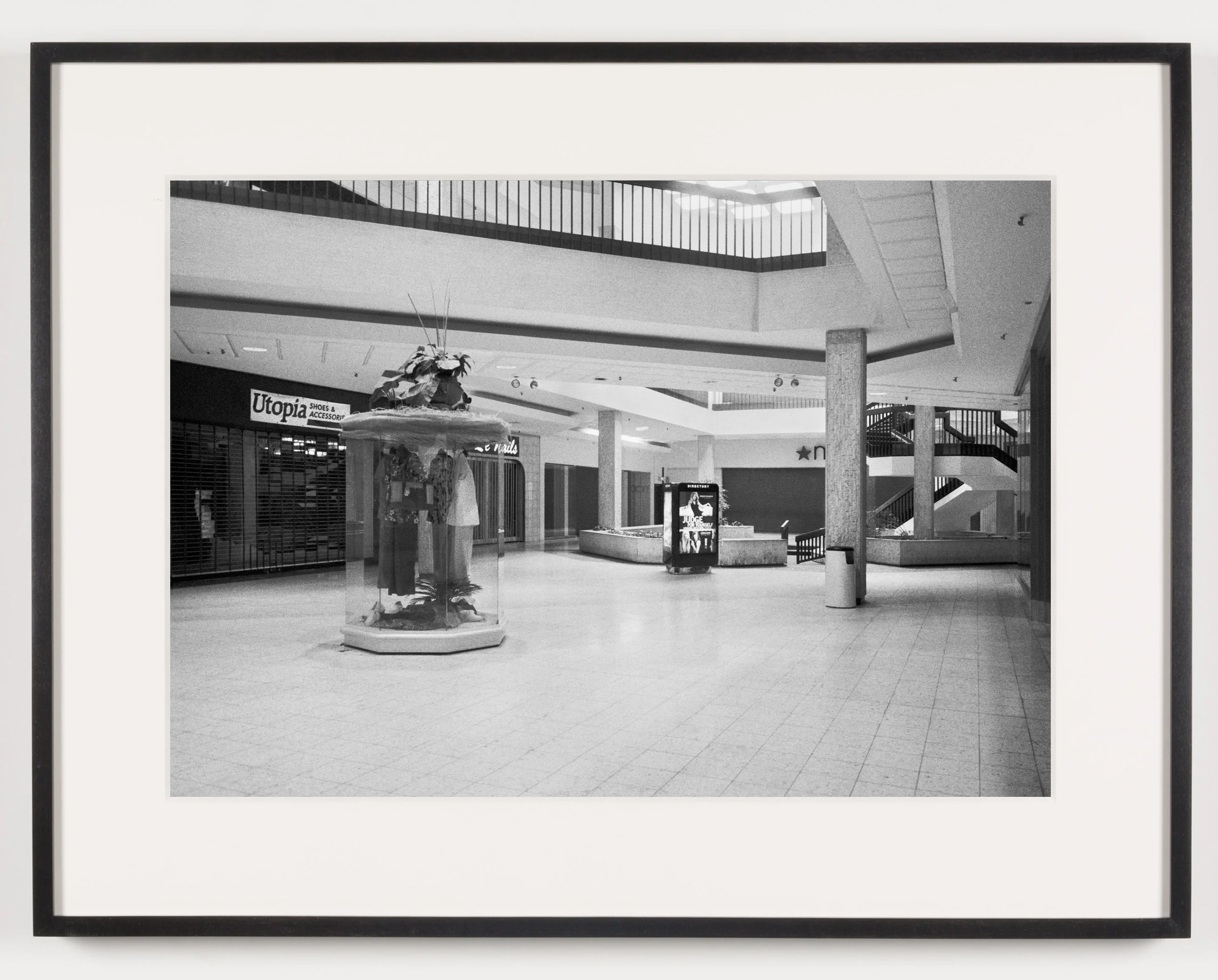 Randall Park Mall ('Utopia Shoes & Accessories,' 'Le Nails,' 'Macy's'), North Randall, OH, Est. 1976, Demo. 2014 2011 Epson Ultrachrome K3 archival ink jet print on Hahnemühle Photo Rag paper 21 5/8 x 28 1/8 inches American Passages, 2001–2011