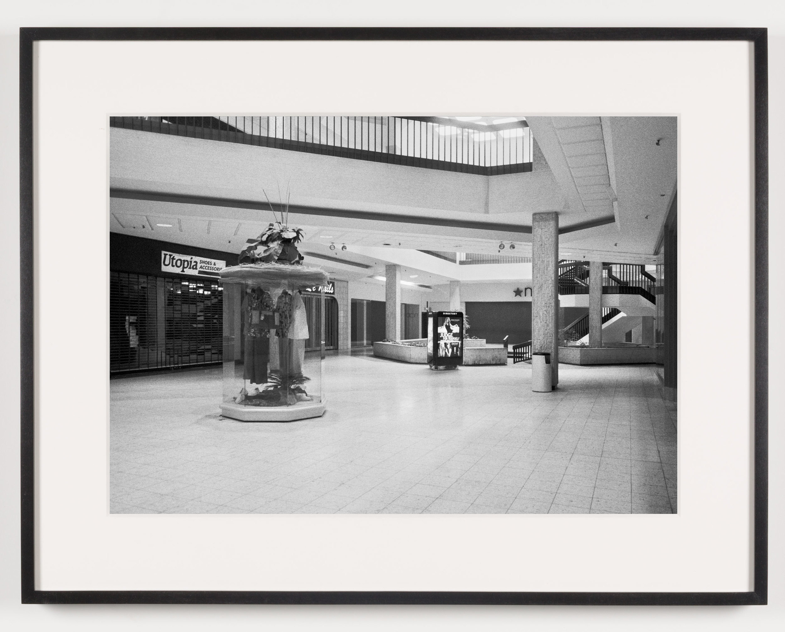   Randall Park Mall ('Utopia Shoes &amp; Accessories,' 'Le Nails,' 'Macy's'), North Randall, OH, Est. 1976, Demo. 2014    2011   Epson Ultrachrome K3 archival ink jet print on Hahnemühle Photo Rag paper  21 5/8 x 28 1/8 inches  Exhibition:   A Diagra