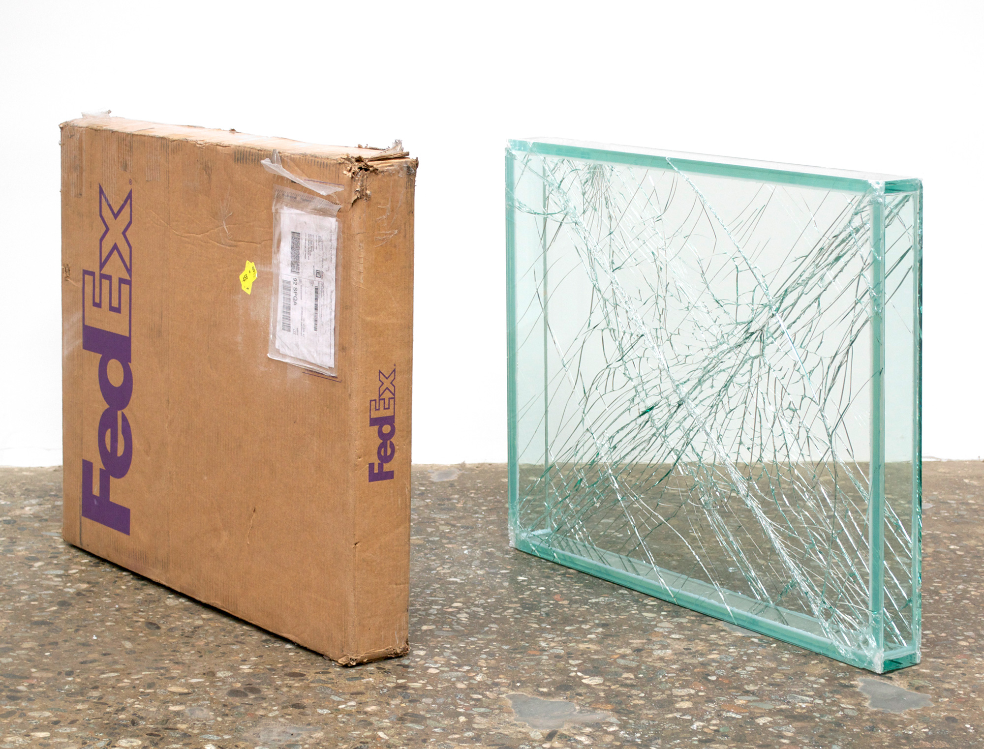   FedEx® Medium Framed Art Box  © 2011 FedEx 163095 REV 7/11 Standard Overnight, Los Angeles–New York trk#798452111018, May 30–31, 2012, Standard Overnight, New York–Los Angeles trk#793621540796, May 31–June 1, 2012    2012–   Laminated glass, FedEx 