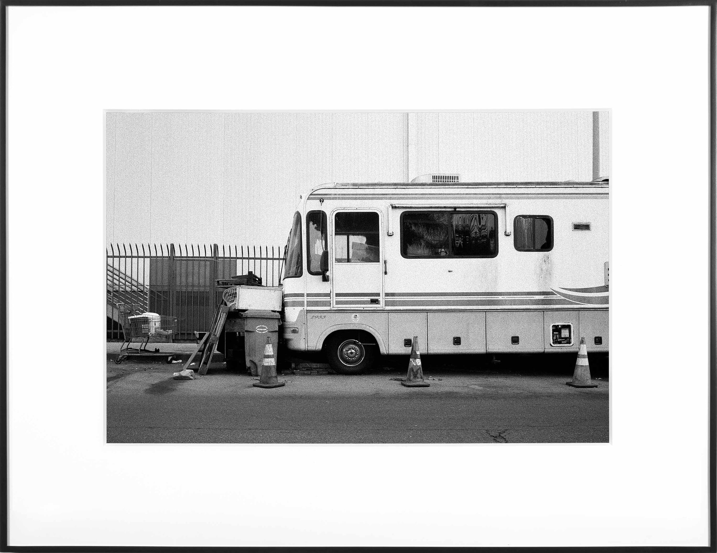   (Temporary) Homes for America: 3300 block to 4400 block, Union Pacific Avenue, between South Grande Vista Avenue and South Marianna Avenue, Los Angeles/Commerce, California, December 2020   2021  black and white fiber print  11 x 15 inches  Exhibit