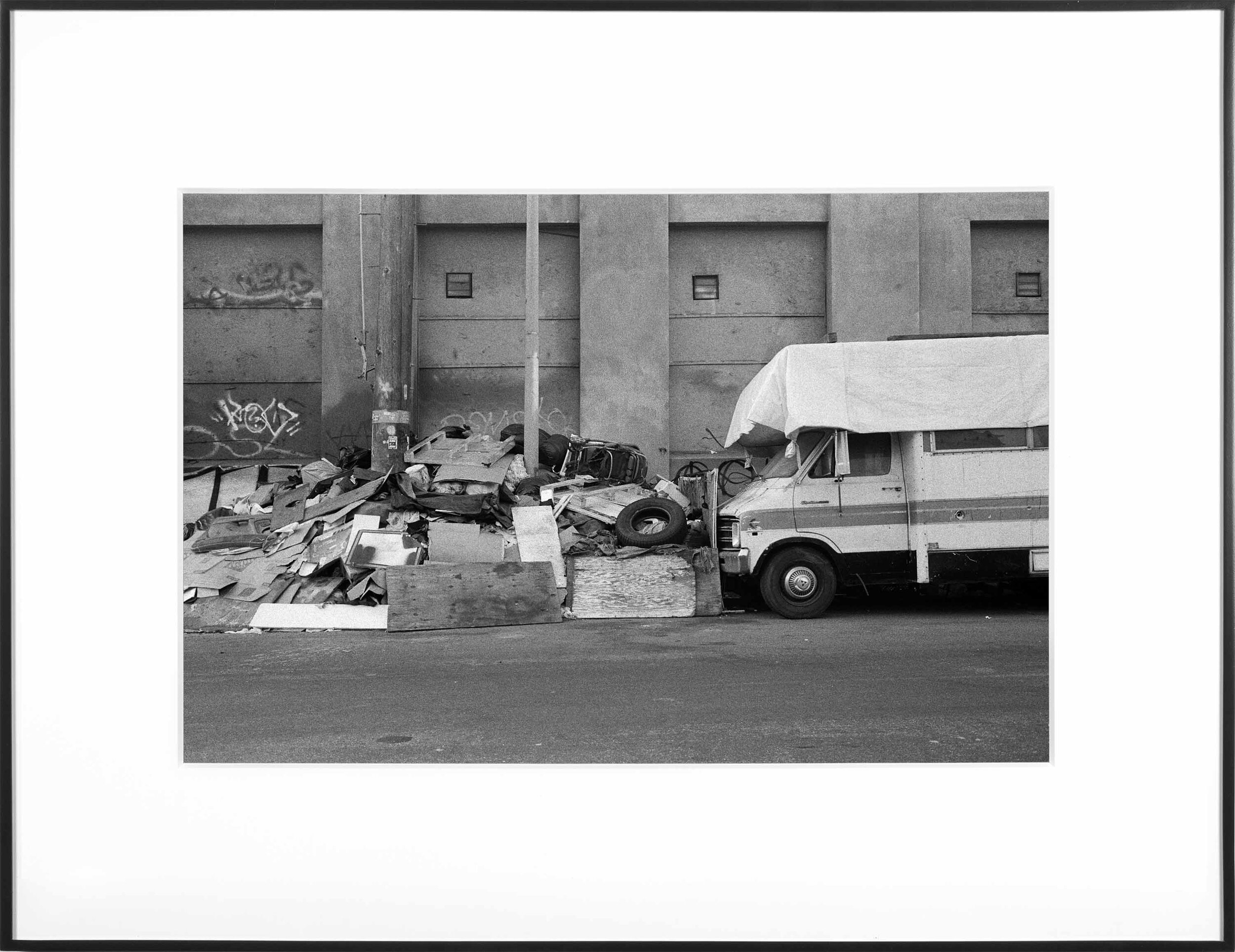   (Temporary) Homes for America: 3300 block to 4400 block, Union Pacific Avenue, between South Grande Vista Avenue and South Marianna Avenue, Los Angeles/Commerce, California, December 2020   2021  black and white fiber print  11 x 15 inches  Exhibit