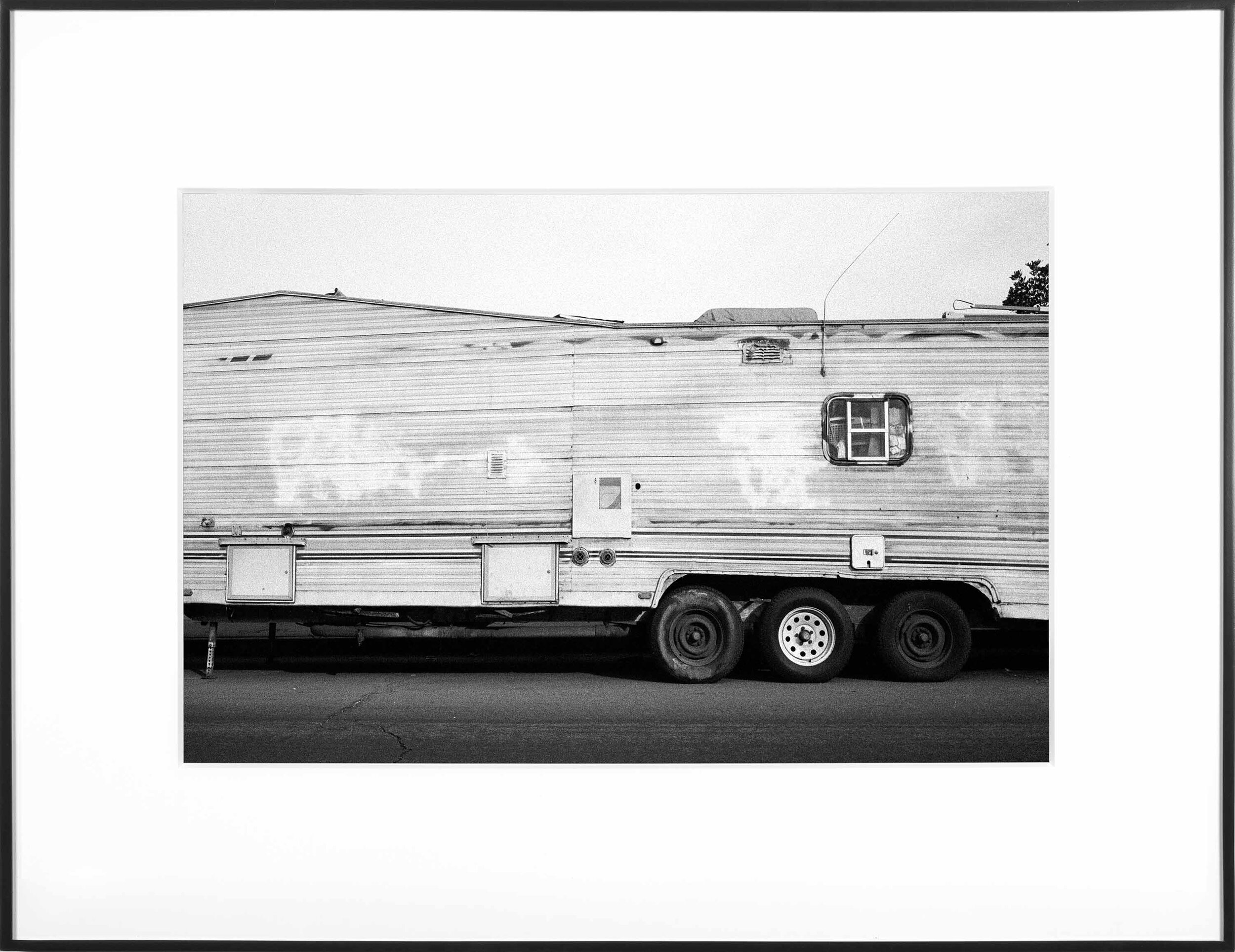   (Temporary) Homes for America: 3300 block to 4400 block, Union Pacific Avenue, between South Grande Vista Avenue and South Marianna Avenue, Los Angeles/Commerce, California, December 2020   2021  black and white fiber print  11 x 15 inches  Exhibit