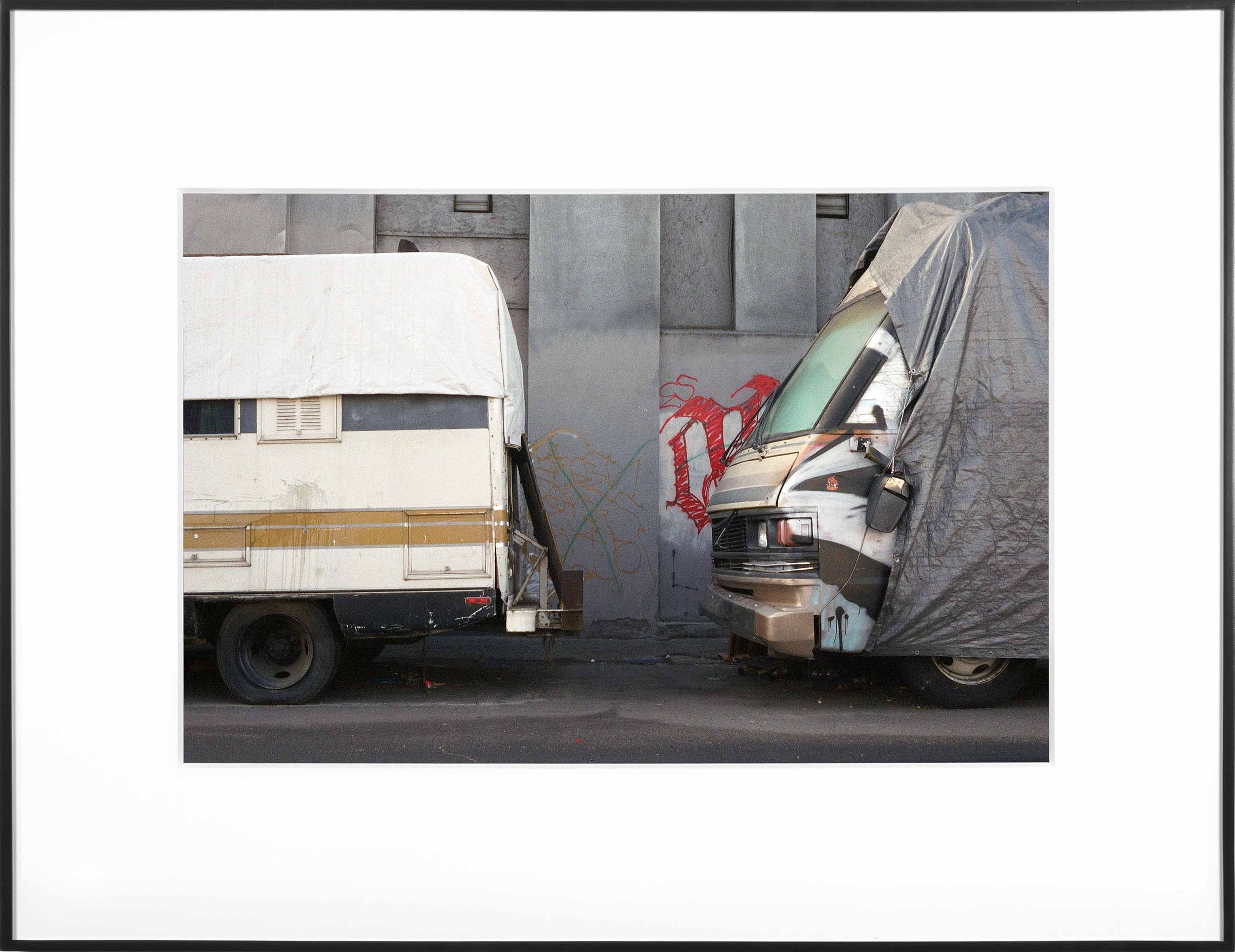   (Temporary) Homes for America: 3300 block to 4400 block, Union Pacific Avenue, between South Grande Vista Avenue and South Marianna Avenue, Los Angeles/Commerce, California, December 2020    2021   Chromogenic print  9 1/2 x 13 inches (24 x 33 cm) 
